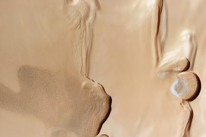 Sand dunes meet stacked ice at Mars’s north pole